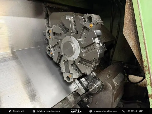 Used MORI SEIKI SL-25 CNC Turning Centers Slant Bed for sale - interior showing spindle, 200 mm chuck, and 10-station turret