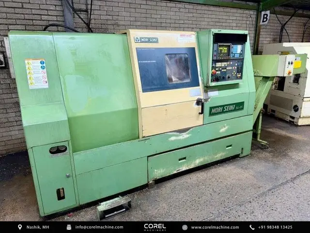Used MORI SEIKI SL-25 CNC Turning Centers Slant Bed for sale - overall front view of the enclosed machine