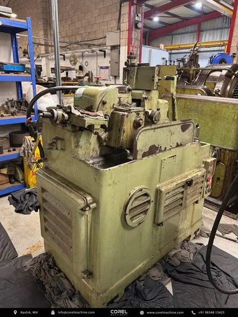 Used ROSSI MONZA 300 Cylindrical Grinders Centerless for sale - front view of the machine showing grinding wheel area